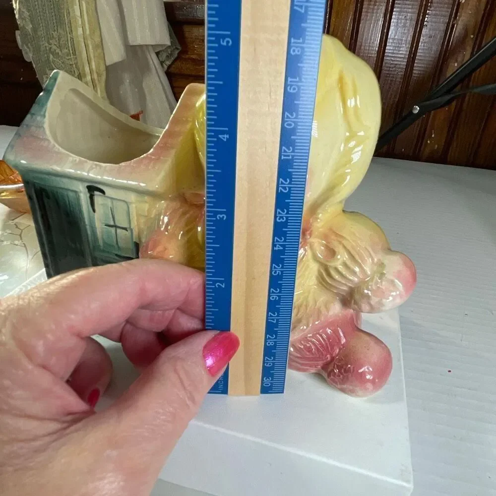 Vintage ceramic American Bisque Yarn Doll planter.